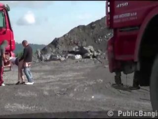 Construction site PUBLIC gangbang with a young charming lady